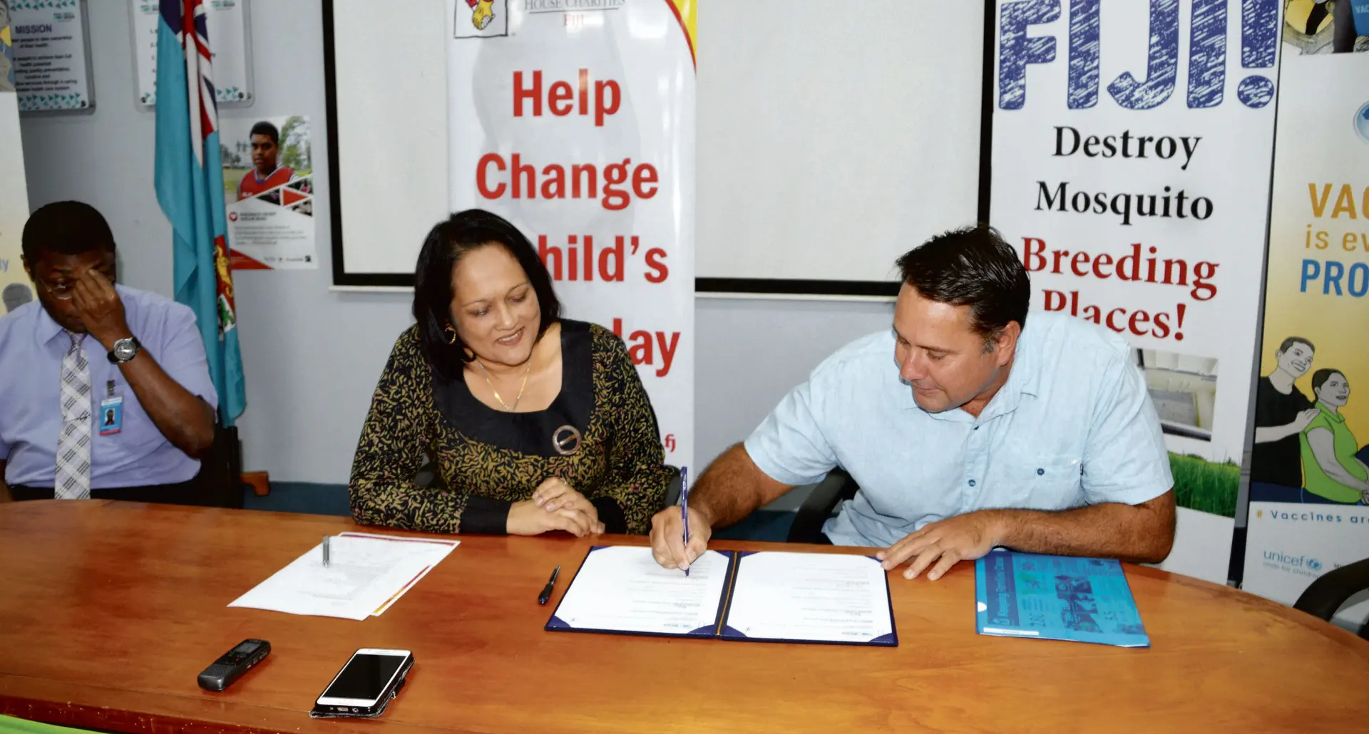 Minister for Health and Medical Services, Rosy Akbar with the Ronald McDonald House Charity company director  Marc McElrath during the MOU signing at the Ministry’s Headquarters in Suva on February 28, 2018.  Photo: Ministry of Health and Medical Services 