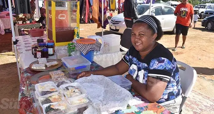 Eseta Sama at the VotCity Flea Market selling food packs. Photo: Mereleki Nai