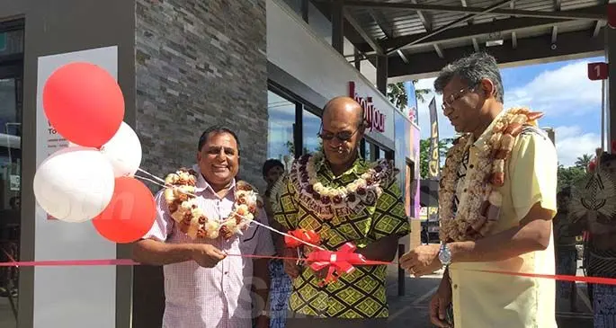 From left: Supreme Fuel Limited managing director Rajesh Patel, Minister for Infrastructure and Meteorological Services and Minister for Lands and Mineral Resources Jone Usmate and TOTAL Fiji managing director Kazi Rahman during the ribbon cutting session at the opening of the refurbished TOTAL Fiji service station in Korovou Town on July 16, 2020. Photo: Laiseana Nasiga