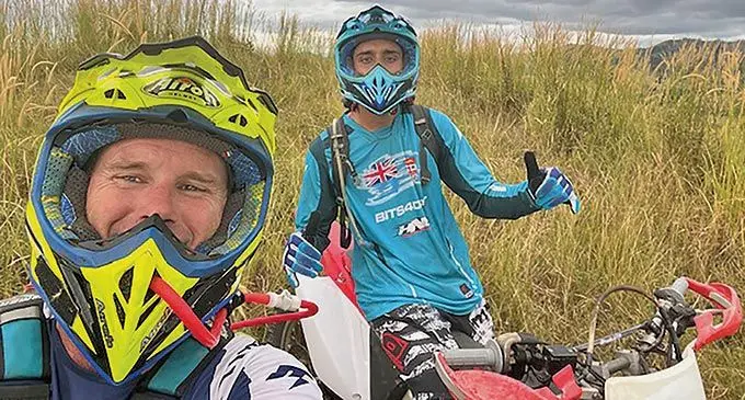 Jason Shugg and a local rider during training. Photo: Supplied