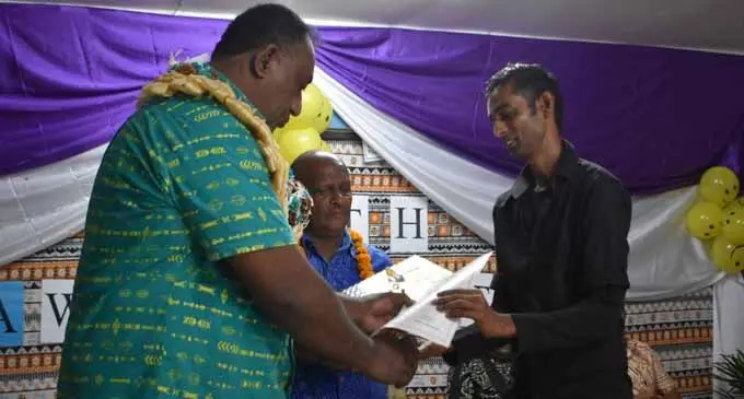 Mohammed Shanil receives his award from Ministry of Youth and Sports director George Francis at Labasa Special School on March 10, 2018 . Photo:: WATI TALEBULA