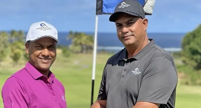 Nitulesh Mali receives his outfit from Natadola Golf operations manager Avinesh Datt. Photo: WAISEA NASOKIA 