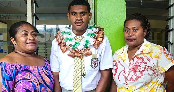 Head boy Temo Raikalevu with Mum (left) Marica Tawake and Aunt, Siteri Verebale. Photos: Kelera Sovasiga