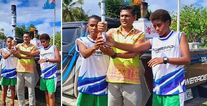 Nadogo Central College athletes, Donasiano Lewanivula (left), school principal, Deepak Prasad and Jeni Ledua hold the Powerade torch at the school on April 21, 2023. Photo: Sampras Anand
