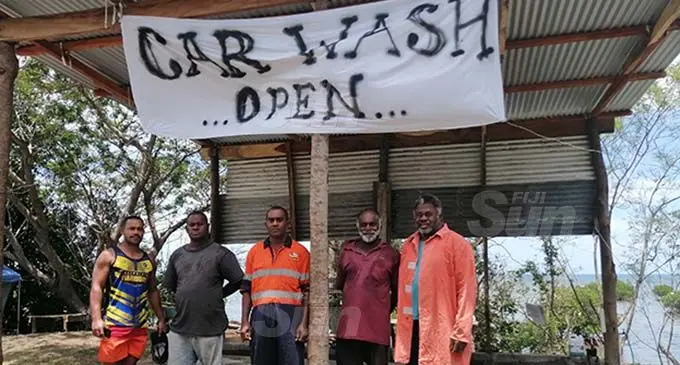 Sitiveni Yamoyamo (first from right), with his brothers at his car wash along the Kings Roads at Navolau 1 in Ra. Photo: Susana Hirst-Tuilau