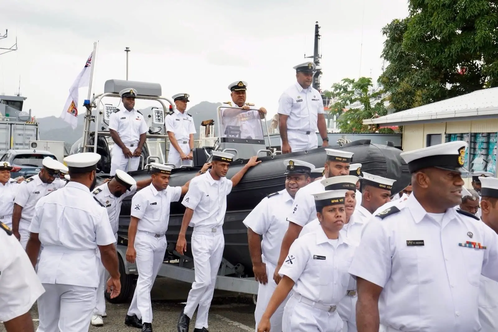 Fiji Navy personnel pull Commodore Humphery Tawake in a ceremonial farewell at Stanley Brown Base as he retires after 37 years of service.