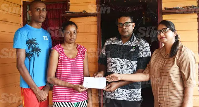From left: Sham Shivneel Chand, Roop Lata, Loans Officer Operations Sugar Cane Growers Fund Labasa Sagar Dayal and Ashiana Shazna during the cheque handover to assist the bereaved family on January 6, 2021. Photo: Laisa Lui