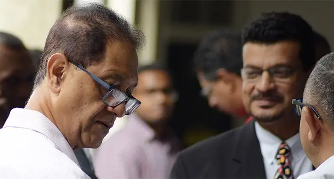 Shazran Abdul Lateef with lawyer (right) Devanesh Sharma outside Court. Photo: Ronald Kumar.