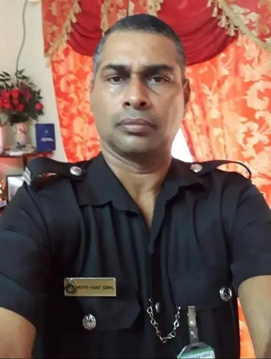 (In happier days....Accident victim, Police Constable Asaf Iqbal, 50.