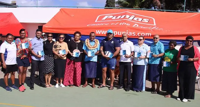 Netball Fiji executives with copies of the 5-year strategic plan in Suva today. Photo: Sereana Salalo