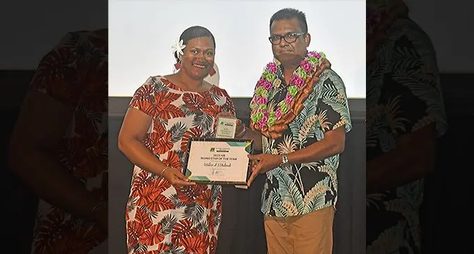 Walesi Vodivodi received her award from Permanent secretary for Multi-Ethnic Affairs and Sugar Industry Yogesh Karan. Photo: Waisea Nasokia