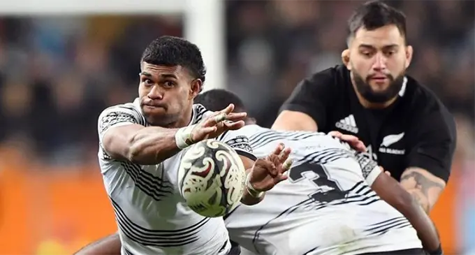 Fiji Airways Flying Fijians halfback, Simione Kuruvoli, passes the ball during the Test Match against the All Blacks at Forsyth Barr Stadium on July 10, 2021 in Dunedin, New Zealand. Young players like Kuruvoli have proved themselves and could be selected to be part of the Fijian Drua in the Super Rugby Pacific 2022.