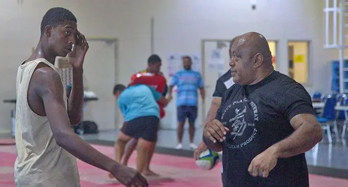 Former Flying Fijians player and trainer Bill Gadolo (right) during a Fijian Drua academy training session at Legalega, Nadi. Photo: Fijian Drua