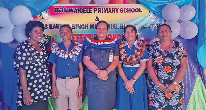 From Left: Miliana Raravuso with her son, Semi Bavoro, chief guest Police Inspector Vasemaca Naborisi, head girl Gurneet Kaur and her mother, Ashmi Devi during the prefect induction at Waiqele Primary School on February 23, 2024.