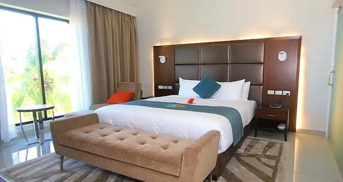 A bedroom at The Palms Denarau.