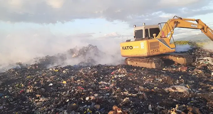 An excavator clearing the site at the Vunato Rubbish Dump in Lautoka where a fire had occurred on August 1, 2021.