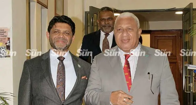 Attorney-General and Minister for Economy Aiyaz Sayed-Khaiyum and Prime Minister Voreqe Bainimarama following the Revised 2021-22 National Budget announcement outside Parliament on March 24, 2022. Photo: Ronald Kumar