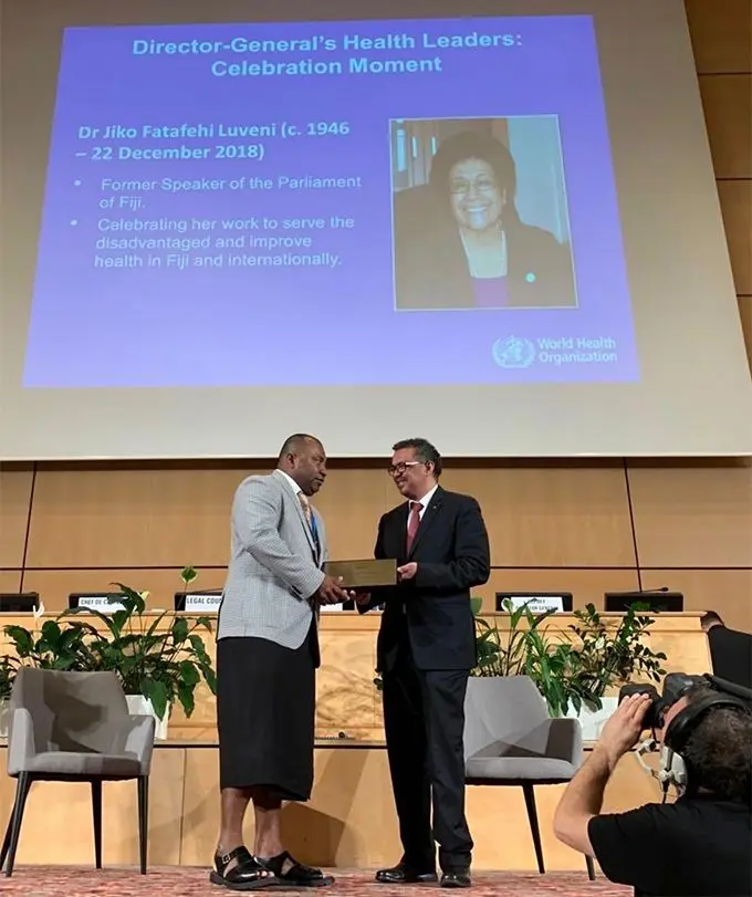 Minister for Health, Dr Ifereimi Waqainabete receives Global Health Hero Award in recognition of the work by the late Speaker of Parliament, Dr Jiko Luveni.