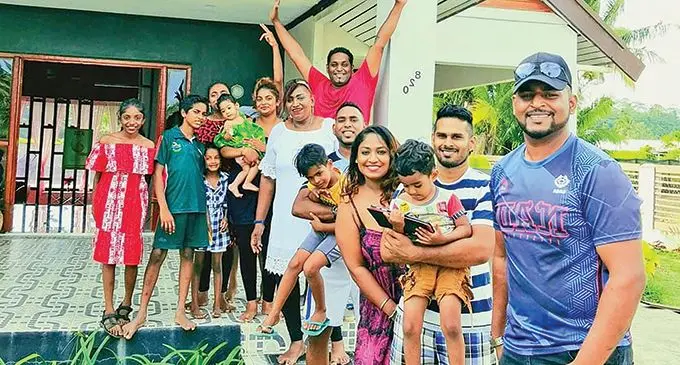 Nelson Chandra with his family.