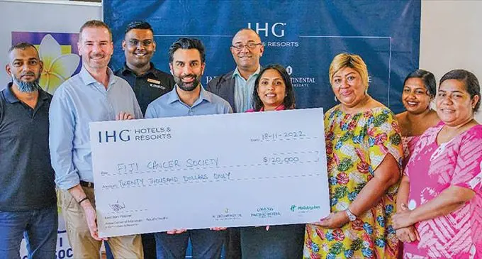 IHG Hotels & Resorts Fiji area general manager, Lachlan Walker(second from left), and colleagues hand over $20,000 cheque to members of Fiji Cancer Society at Grand Pacific Hotel, Suva on November 18, 2022. Photo: IHG Hotels & Resorts Fiji