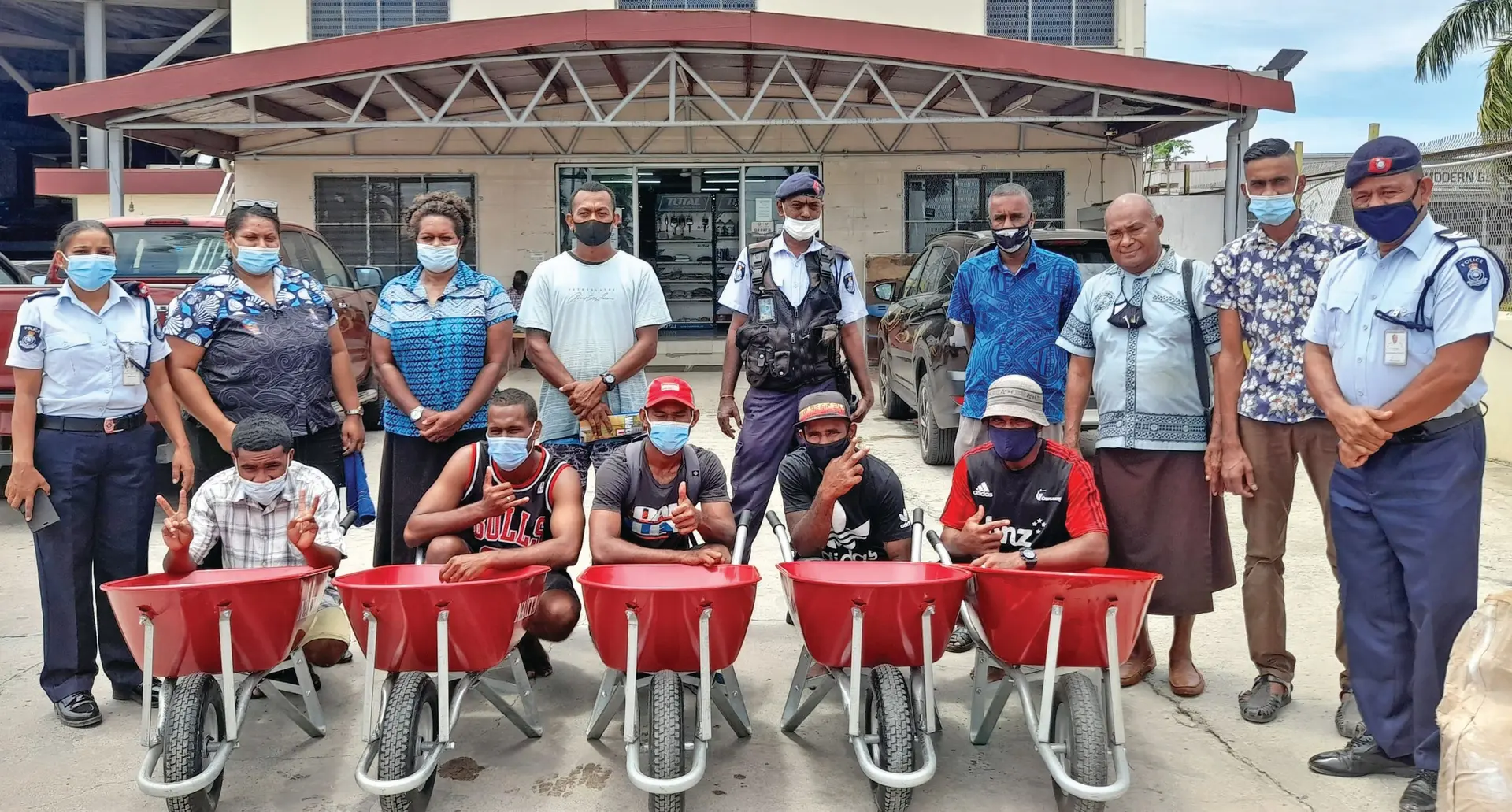 Ratu Asaeli Driu (3rd from right) with his Nadina Support Group, The Nadi Community Policing and the Wheelbarrow boys in front at Nadi Town. Photo: Mereleki Nai