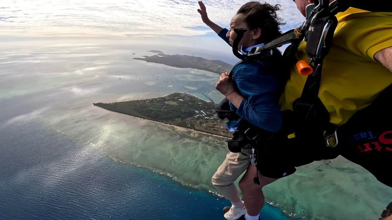 Tourist Chuan Yi Zheng about to experience skydiving over Maiolo Lailai with Fly Fiji chief executive officer Tim Joyce.