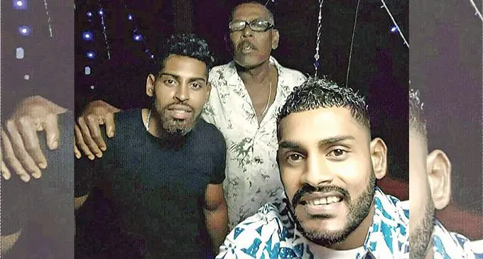 Digicel national football captain Roy Krishna (left) with his late father Bal Krishna (middle) and brother Krishneel Krishna.