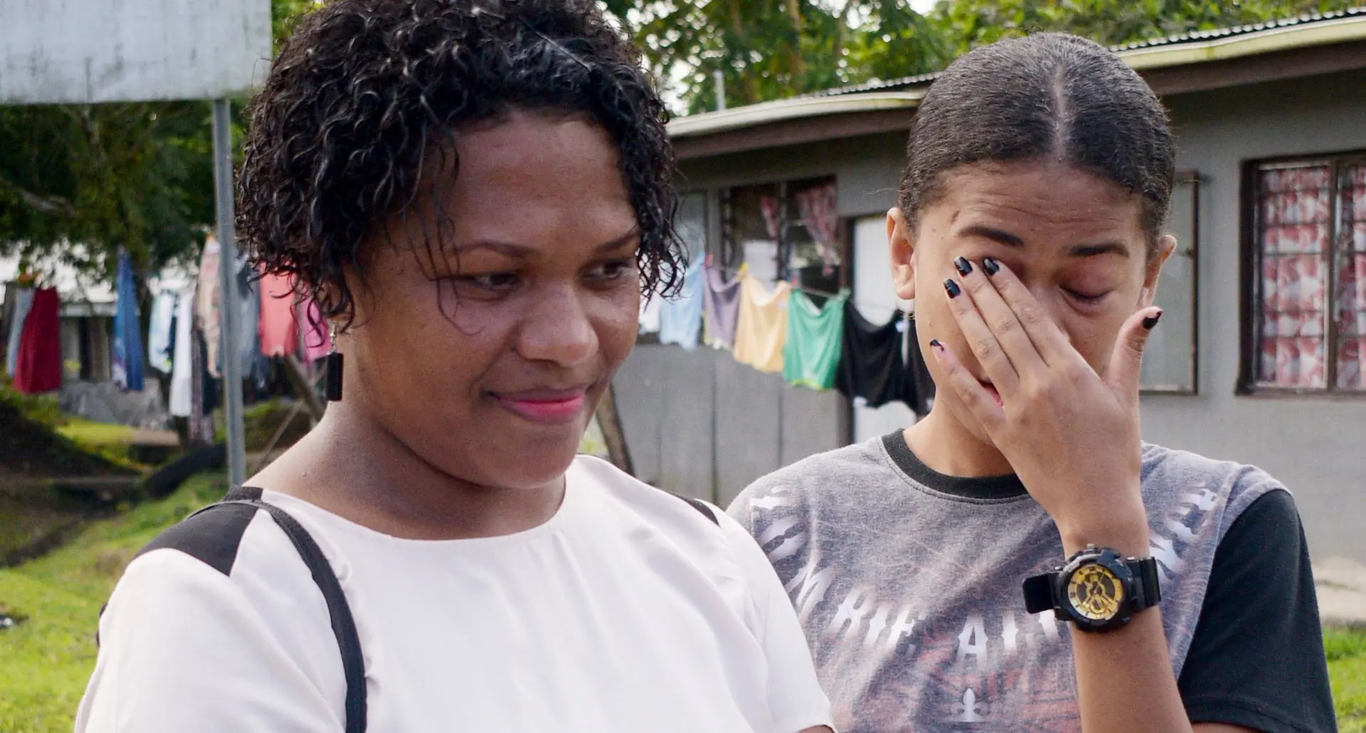 Tavesisa Waqa (left) and Rosi Vusarogo mourn the death of their niece and sister, Vika Radinibau 25, who died in road accident at Vesida Place, Nasinu. Photo: Ronald Kumar.