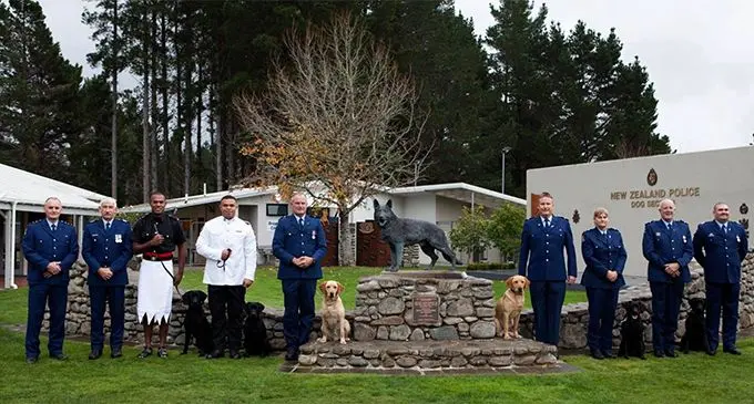 Police Constable Neumi Waqanokonoko third from left. He graduated in the  NZ Pacific Detector Dog Programme.