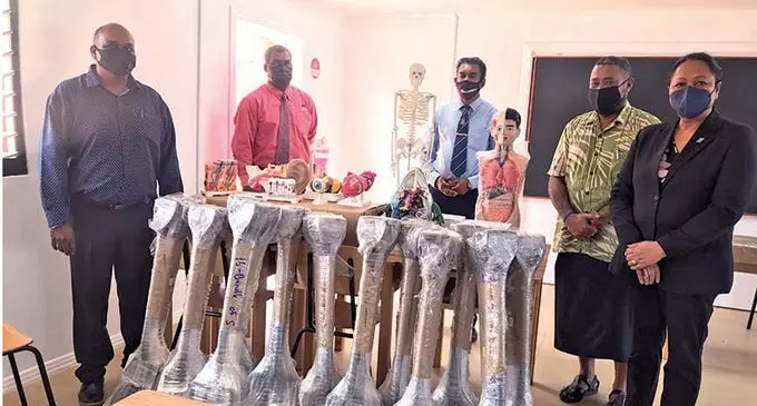Minister for Education, Heritage and Arts Premila Kumar (right) with Tui Namosi Suliano Matanitobua (second from right) and staff of Ratu Simione Matanitobua Secondary School in Lobau, Navua during the handover of equipment on October 21, 2021, provided by the Government of Korea.  Photo: Wati Talebula-Nuku