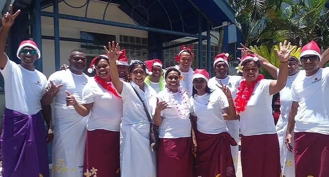 The Naviti Resort director of sales and marketing, Angela Hassan (front row, fourth from left) with staff members of The Naviti Resort at the Fiji Sun office in Suva on December 8, 2022. Photo: Jone Salusalu