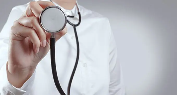 Doctor with a stethoscope in the hands