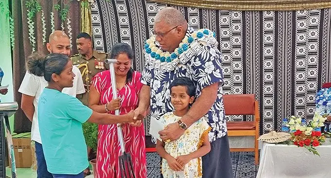 Moreen Ram (wearing green tee-shirt), 35, is 2023 best young farmer (female), with President Ratu Wiliame Katonivere, in Labasa on October 12, 2024. Photo: Sampras Anand