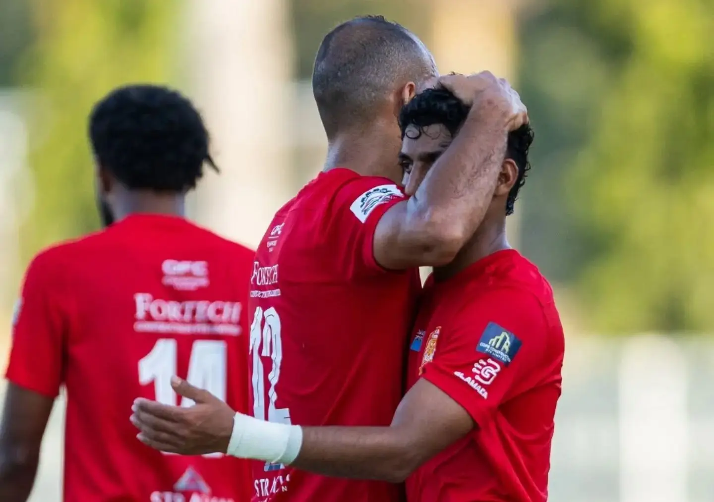Rewa player/coach Tevita Waranivalu (left) embraces Ramzan Khan after scoring their first goal against Tupapa Maraerenga FC at Govind Park, Ba, on August 12, 2026. Rewa won 4-2. Photo: OFC Media.