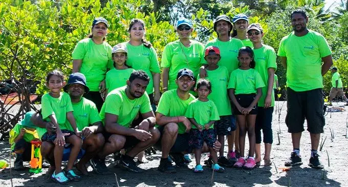The staff of Douglas Pharmaceuticals Fiji Limited during the mangrove planting programme at Korotogo, Coral Coast. Photo: Waisea Nasokia