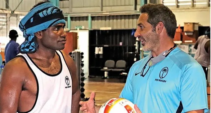Two-time Olympic Games gold medallist Jerry Tuwai (left) meets Fiji Airways Fijian 7s head coach Ben Gollings during their training session in Suva on January 13, 2022. Tuwai is a definite starter for the next round of the HSBC World Sevens Series in Spain. Photos: FRU Media 