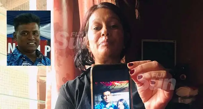 Jayant Shobna holds up the last photo she took with her husband, the late Chandar Prakash Reddy. Photo: Salote Qalubau Inset: The late Chandar Prakash Reddy