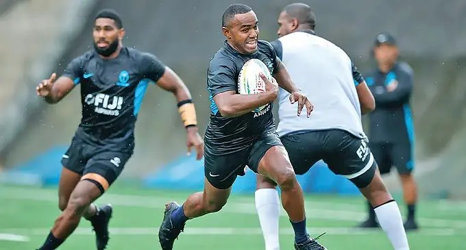 Fiji Airways Fijian men’s sevens rugby captain Waisea Nacuqu in full flight during training, following him is Paula Nayacakalou with Josua Vakurinabili (back to camera) in Hong Kong, China, on November 1, 2022. Photo: World Rugby.