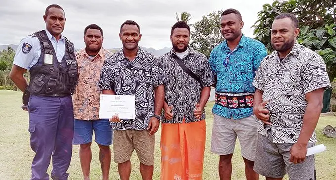 Adriu Naisiroki (third from left) with the grant certificate he received from the Minister for Youth and Sports Parveen Bala.  Photo: Susana Hirst-Tuilau