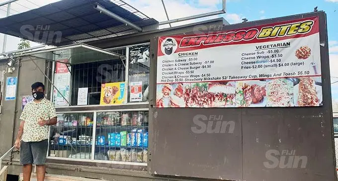Anushil Gounder stands in front of his container which he uses as a shop and to make fast-food in Lovu, Lautoka. Photo: Nicolette Chambers
