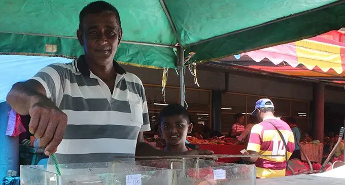 Fish farmer Edwin Prasad with his fish outside the Suva market on March 2,2019.Photo:Simione Haravanua.
