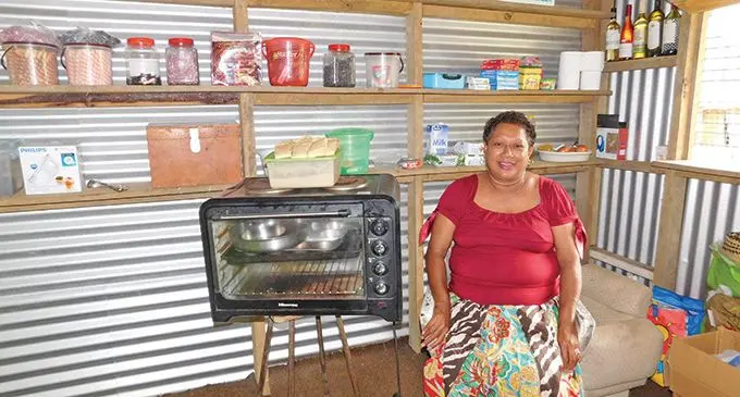 Loata Senibale inside her canteen.