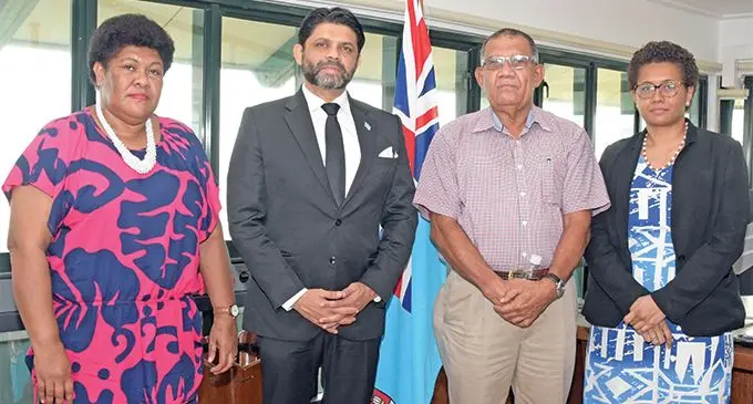 Attorney-General Aiyaz Sayed-Khaiyum (second from left) with the late Merelesita Lutu’s family members. Photo: DEPTFO News