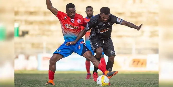Blue Gas Navua’s Isake Naduvu (left) and Dayal Saw Millers Ba’s Penaia Nagatalevu fights for possession in their Bic Fiji Fact Group A clash at the HFC Bank Stadium in Suva. Ba won 1-0. Photo: Josua Buredua