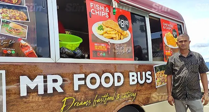 Ravinesh Kumar with his new mobile eatery, Mr Food Bus, at the Nasese, Suva. Photo: Ivamere Nataro