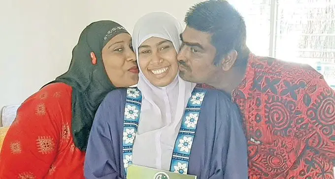 From left: Shireen Nisha (mother), Zoya Shazmin Nisha and Father Tazim Ali after the Kamil Muslim College Awards Day in Ba on December 2, 2020. Photo: Salote Qalubau