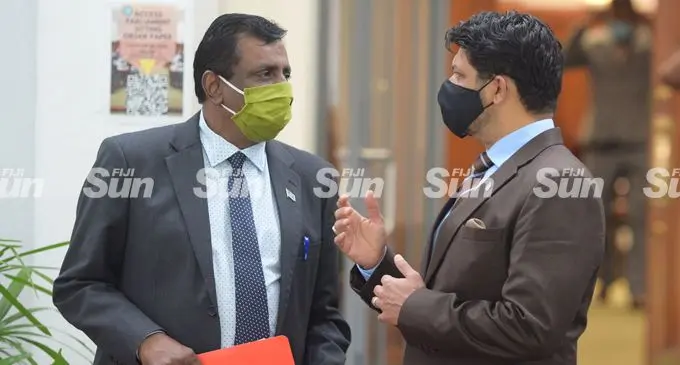 Minister for Youth and Sports Praveen Bala with Acting Prime Minister and Attorney General Aiyaz Sayad-Khaiyum outside Parliament on February 9, 2022. Photo: Ronald Kumar