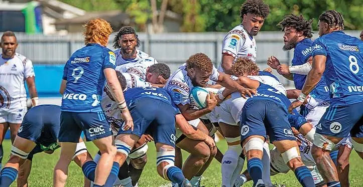 Captain courageous Tevita Ikanivere (with ball) of the Swire Shipping Fijian Drua finds it tough against the Blues during round 10 of the Super Rugby Pacific at Lautoka's Churchill Park on April 29, 2023. Photo: Leon Lord