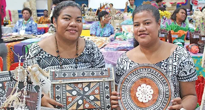 Sisters Koto Matemosi (left) and Ilisapeci Matemosi (right) show off traditional handmade intricately designed handicraft at the 2019 Fiji National Women’s Expo on June 12, 2019. Photo: Ronald Kumar
