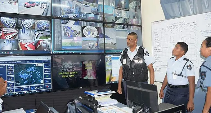 Police Chief Operations Officer ACP Abdul Khan (left), at the election command and control centre . Photo: Ronald Kumar